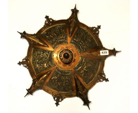 A heavy bronzed and copperized metal ceiling light centrepiece mounted as a wall hanging, Dia. 47cm.