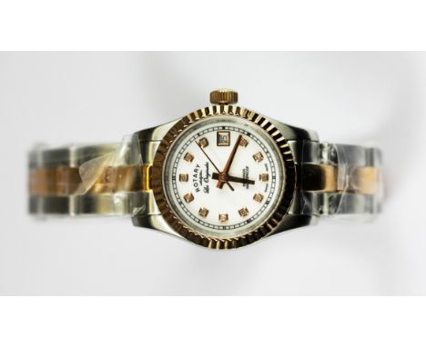 A boxed lady's Rotary gold plated stainless steel wrist watch with diamond set dial, unused.
