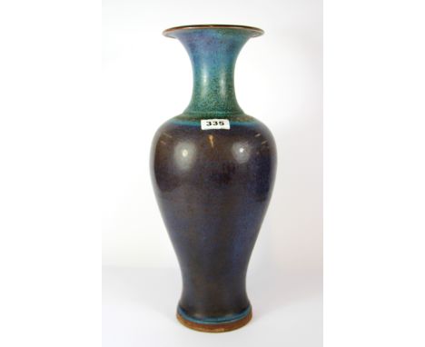 An impressive Chinese Zhun glazed red clay pottery vase, H. 44cm.