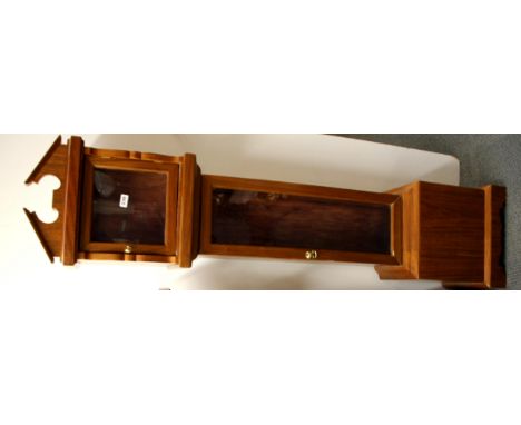 A contemporary mahogany longcase clock case, H. 180cm.