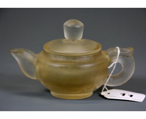 A Chinese carved rock crystal teapot, H. 8.5cm.