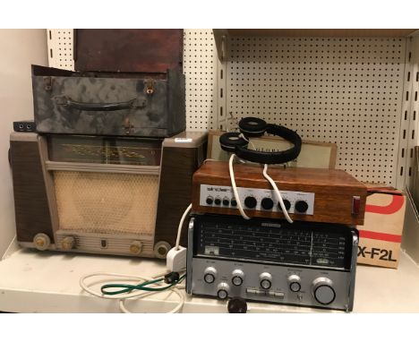 A group of vintage radios.
