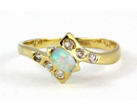 A 14ct yellow gold opal and white stone set ring, (I.5)