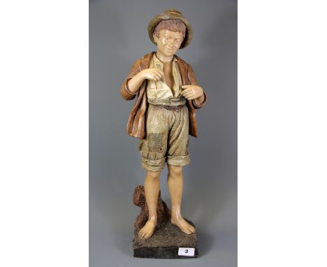 A Goldscheider figure of a boy, H. 58cm. A/F