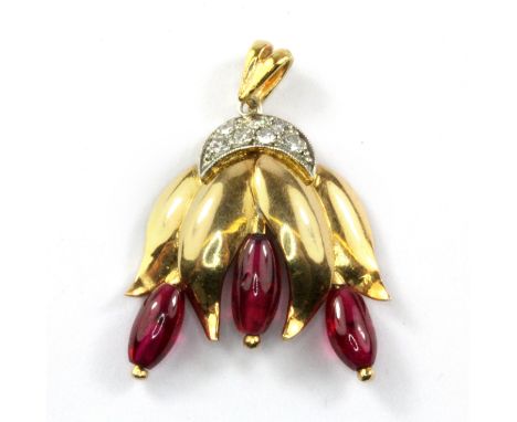 A yellow metal (tested high carat gold) ruby and diamond set pendant, L. 3cm.