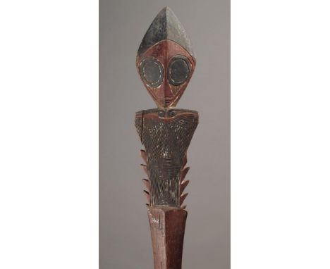 A Buka Island ceremonial paddle Solomon Islands, Melanesia wood with red, black and white pigment, the Janus finial with larg
