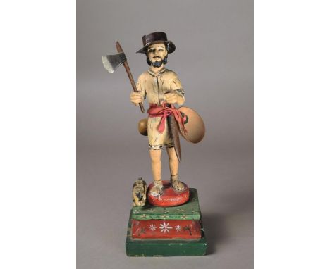 A Yucatan figure of San Isidro South America wood and paint, dressed as a henequen collector, wearing a wide brimmed hat and 