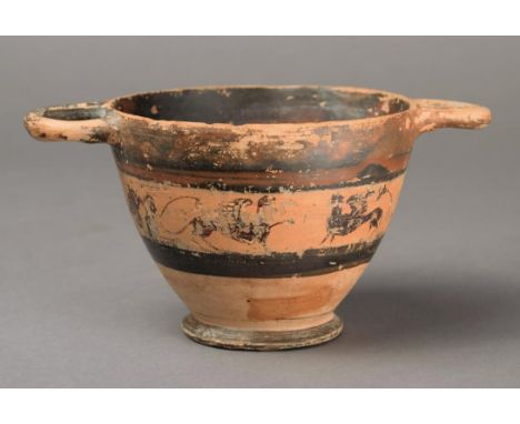 A Greek skyphos raised on a spreading foot, the body painted a band of griffins and sphinx, the rim with a pair of open handl