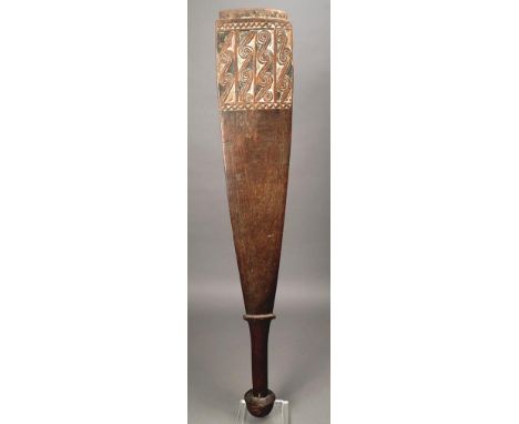 A Massim club Trobriand Islands, Papua New Guinea wood, the wide blade with a rounded and flat side with scroll and zig-zag c