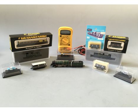 Various miniature model Great Western trains including Graham Farish, mainline coach, King Class King Edward II train and car