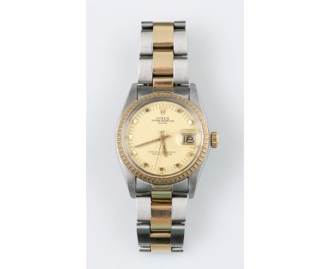 A 1970s Rolex Oyster Perpetual Date Chronometer bi-coloured wrist watch, the gold tone dial having hourly square markers with