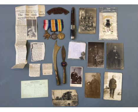 A collection of World War I memorabilia belonging to Alfred Boult including newspaper clippings detailing secret 'ironclads' 