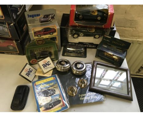 Various car related items including boxed model vehicles to include Corgi and Jaguars, car mascots, framed car stamps, etc.