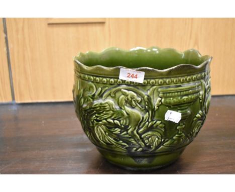 A Victorian planter having embossed dragon design stamped Gregorian to base