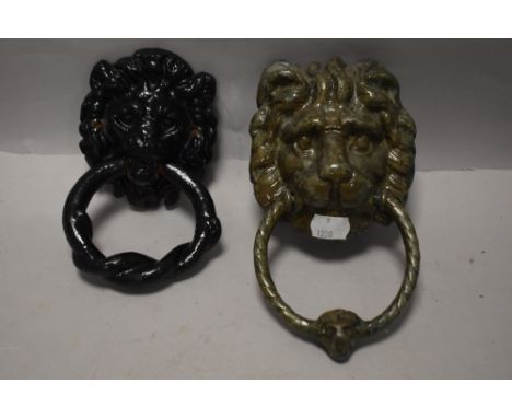 Two vintage cast iron lions head door knockers