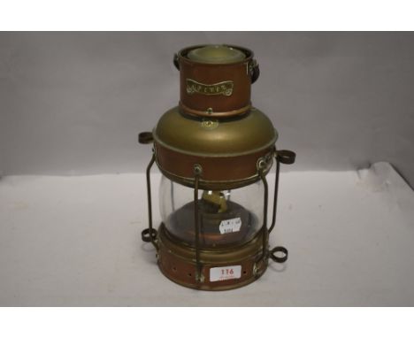 A 20th century copper and brass ships light or lantern, with label reading anchor, glass in good condition.