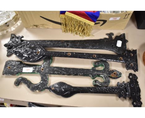 A selection of wrought iron door or furniture straps