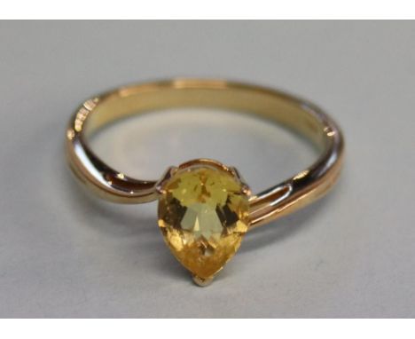 A 9ct gold pear cut and citrine ring, size 'N'