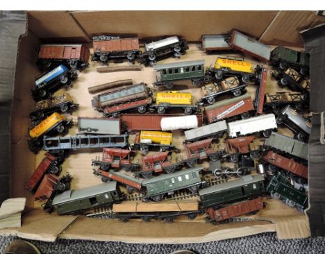 A box of Forty Marrklin HO scale pre and post Wagons and Trucks