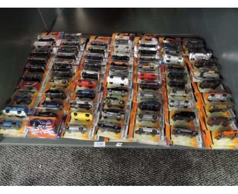 A shelf of modern Matcbox diecasts, all in blister packs, 140 in total