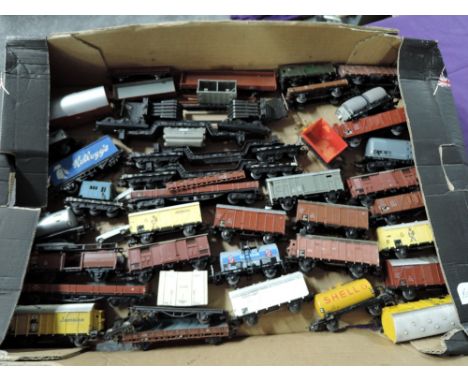 A box containing Thirty Four Marklin HO scale Wagons &amp; Trucks including four rare 12 Wheel Bolsters