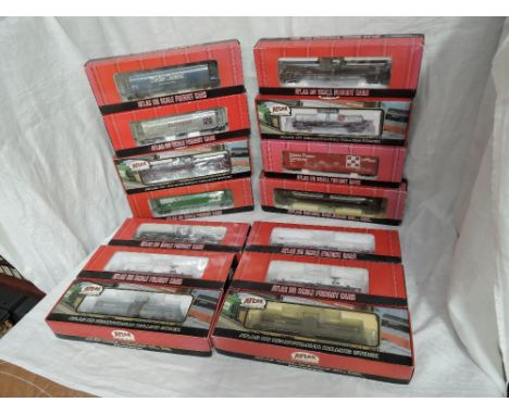 Fourteen Atlas HO scale items of rolling stock, ACF 23500 Gallon Tank Cars x4, ACF Kaolin Tank Cars x2, 17360 Gallon Tank Car