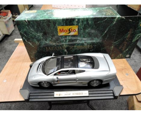 A Maisto 1:12 scale diecast model, Jaguar XJ220, boxed