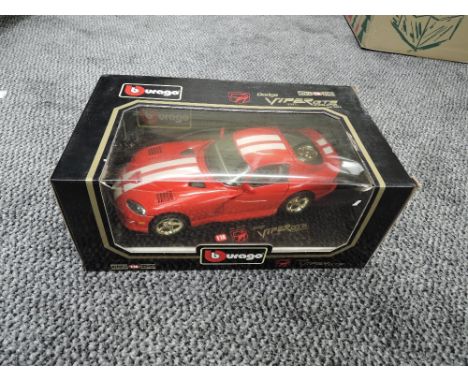 A Burago 118 scale diecast, Dodge Viper GTS Coupe, on stand in original box