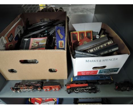A shelf of 00 gauge including a Marklin Western Germany 4-6-2 three rail Loco &amp; Tender in a Wrenn box, Triang Diesel Loco