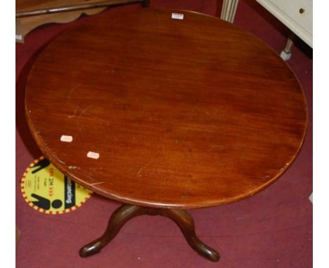 A 19th century mahogany and oak circular tilt-top pedestal tripod table, dia. 68cm