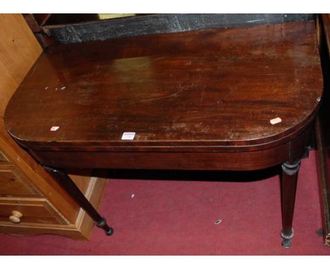 An early 19th century mahogany round cornered fold-over card table, width 90cm