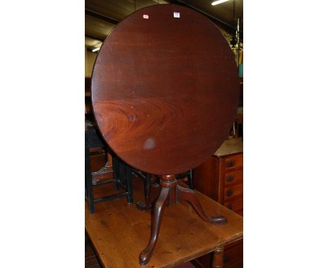 A 19th century mahogany circular tilt-top pedestal tripod table, with birdcage undertier, dia. 83cm