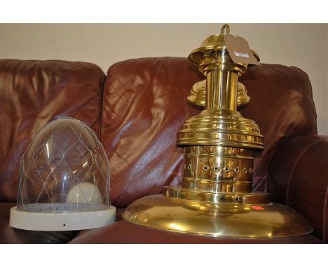 A contemporary polished brass domed hanging ceiling light with glass shade, approx. drop 80cm