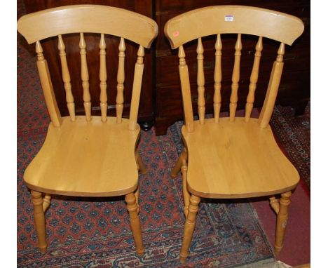 Six various contemporary pine and beech stick back kitchen chairs