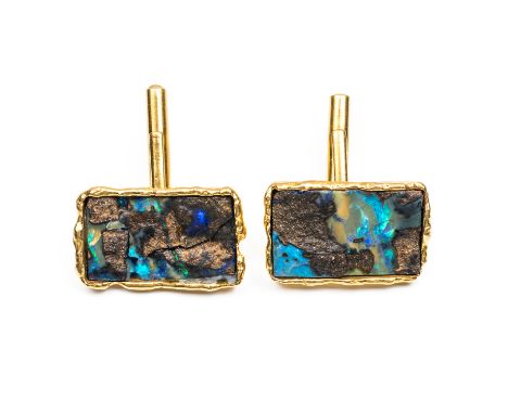 A PAIR OF 18CT GOLD AND OPAL CUFFLINKSThe rectangular fronts having rustic borders (one front opal damaged) and with folding 