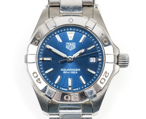 A TAG HAUER AQUARACER STEEL LADY'S BRACELET WRISTWATCHThe signed blue dial with baton hour markers, centre seconds and with a