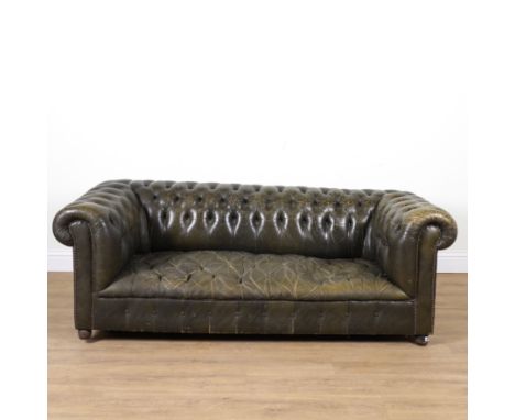 A 20TH CENTURY CHESTERFIELD SOFAWith button back leather upholstery, 200cm wide; 70cm highback leg loose&nbsp;