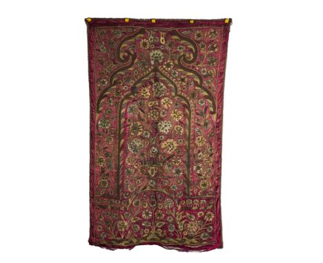AN OTTOMAN GILT-METAL THREAD AND APPLIQUÉ SATIN SILK WALL HANGING19th Century 
The central flower filled urn within a pointed