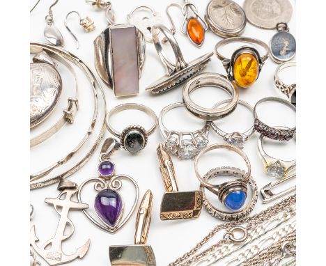 A GROUP OF MOSTLY SILVER JEWELLERY (50)Comprising; fourteen rings, twelve pendants, charms and lockets, a pair of cufflinks, 