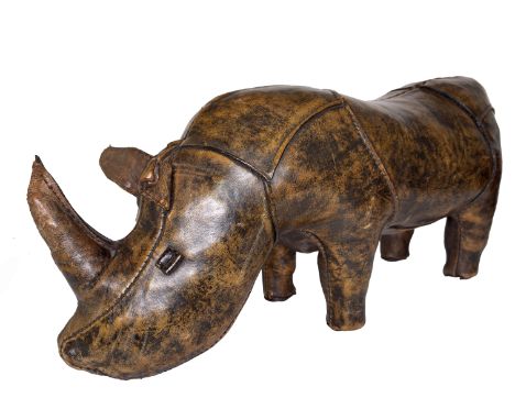 A STITCHED LEATHER RHINOCEROS FOOT STOOLProbably by Omersa, for Liberty & Co. 
Rolled leather eyes, foot pads, 65cm wide; 28c