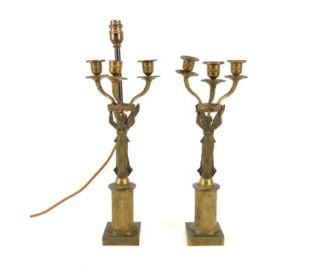 A PAIR OF FRENCH EMPIRE STYLE GILT BRASS THREE LIGHT CANDELABRA ADAPTED TABLE LAMPS (2)Late 19th Century 
Each laurel wreath 