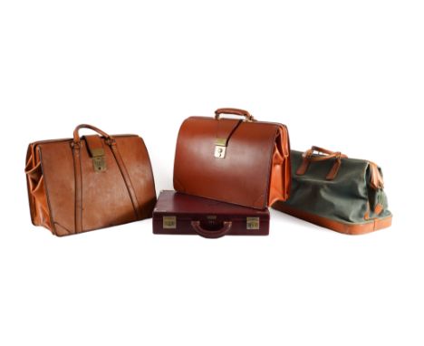SWAINE & ADENEY, TANNER KROLLE & CARTIER: THREE LEATHER BRIEF CASES AND A HOLD-ALL (4)The tan leather cases with locks, the T