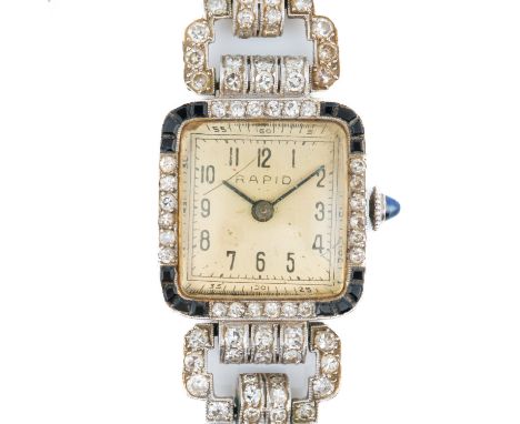 A RAPID DIAMOND AND BLACK ONYX ART DECO LADY'S BRACELET WRISTWATCHThe signed square dial with black Arabic numerals and blued