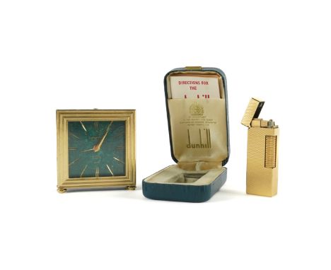 ALFRED DUNHILL LTD.: A GOLD PLATED ROLLAGAS POCKET LIGHTER (2)With malachite panel to hinged old, stamped Dunhill, Pat. RE.24