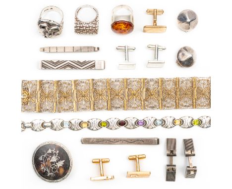 A GROUP OF SILVER, FOREIGN AND COSTUME JEWELLERYComprising; two Georg Jensen tie slides, another tie slide, a pair of earclip