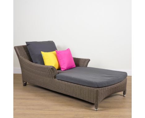 BRIDGMAN LUXURY OUTDOOR FURNITURE; A FAUX RATTAN GARDEN LOUNGERWith loose cushion upholstery, 110cm wide; 195cm long