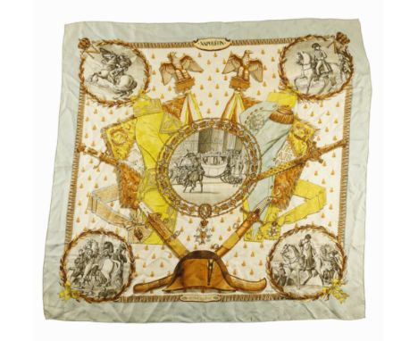 HERMES, PARIS: A NAPOLEON SILK SCARF IN PALE BLUE AND YELLOWDesign by Philippe Ledoux, First issued in 1963
Jacquard bees ove