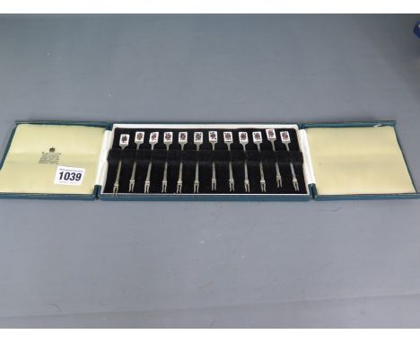Garrard and Co - a boxed set of twelve silver and enamel playcard cocktail sticks, Birmingham 1961/62 - Weight approx. 1.9 tr