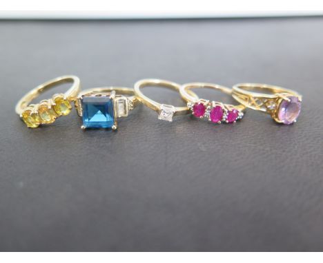 A collection of five 9ct gold dress rings to include a princess cut diamond 0.15ct, three stone citrine, amethyst and diamond