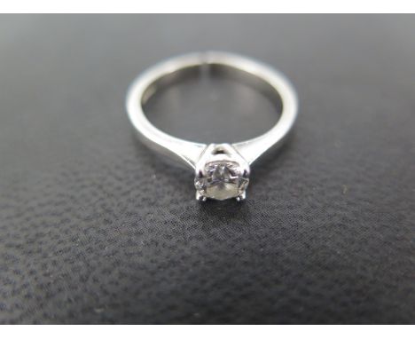 A platinum diamond solitaire ring - the stone measures approx 0.36ct - shank size approx J - shank has been cut and surface m